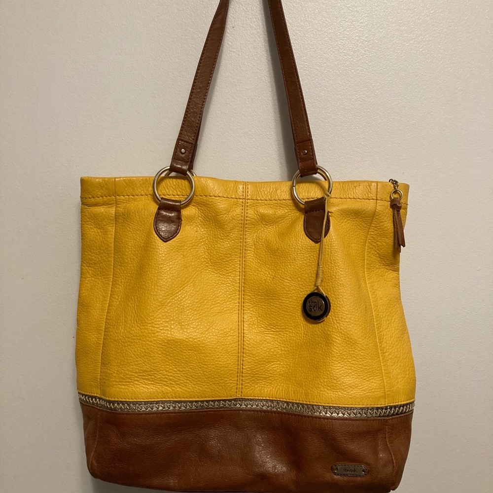 The Sak yellow and brown leather purse